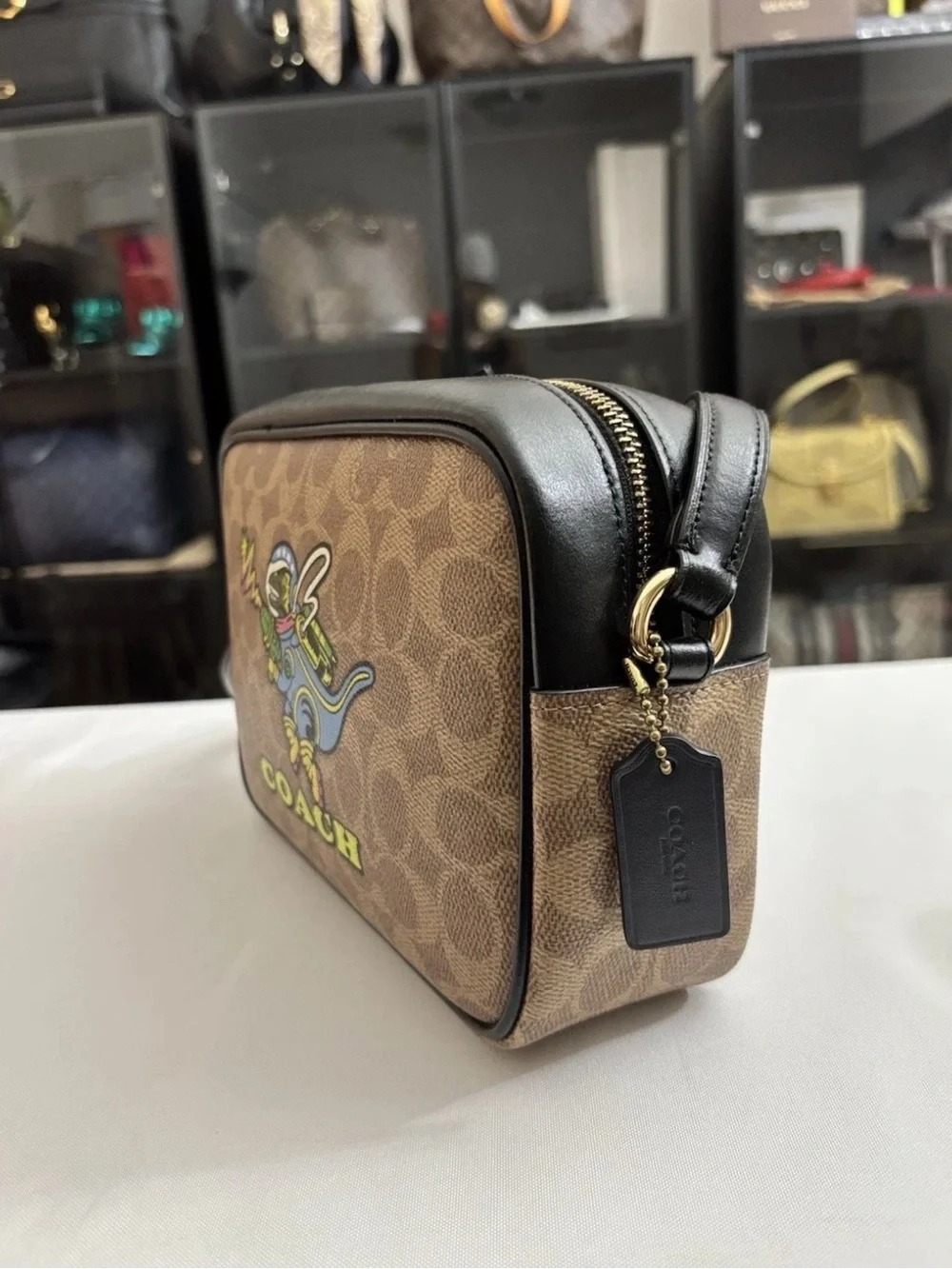 Coach Signature Jamie Camera Bag With A Playful  Rexy Dinosaur Print Crossbody.